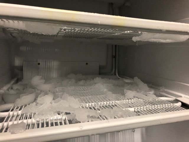 Upclose image of a freezer while it is defrosting.