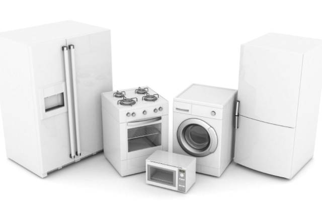 A group of kitchen appliances in a white background.