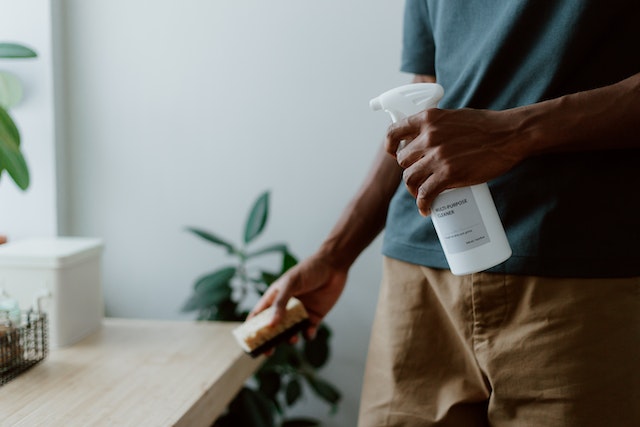 An eco-friendly kitchen cleaner used to clean a table.