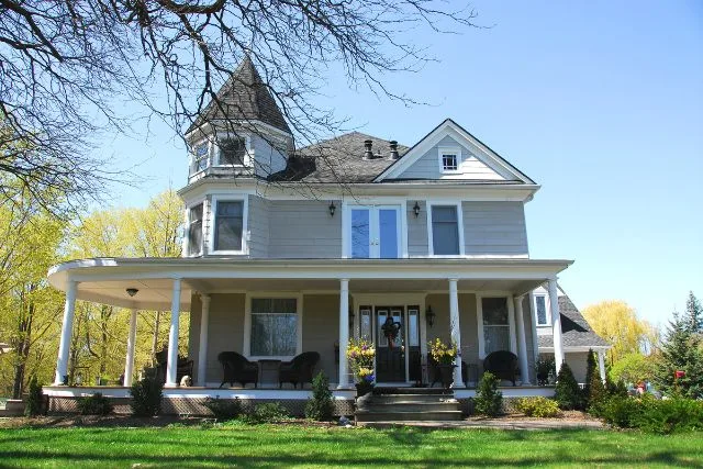 An old victorian house in summertime.
