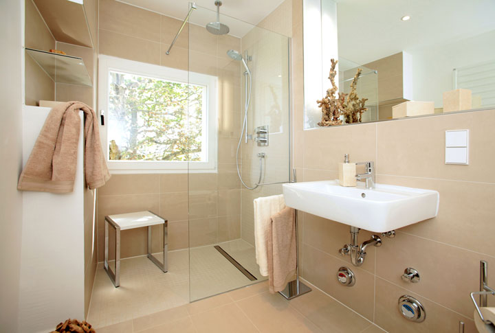 Easy access shower with stool for convenience.