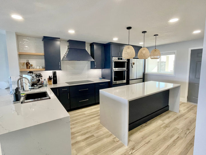 Stylish kitchen with predominately grey and dark blue features