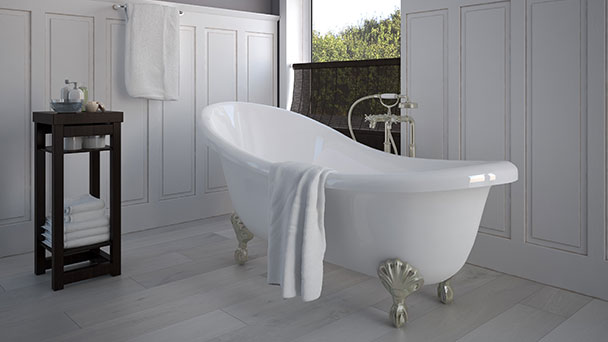 White bathtub with brass legs.