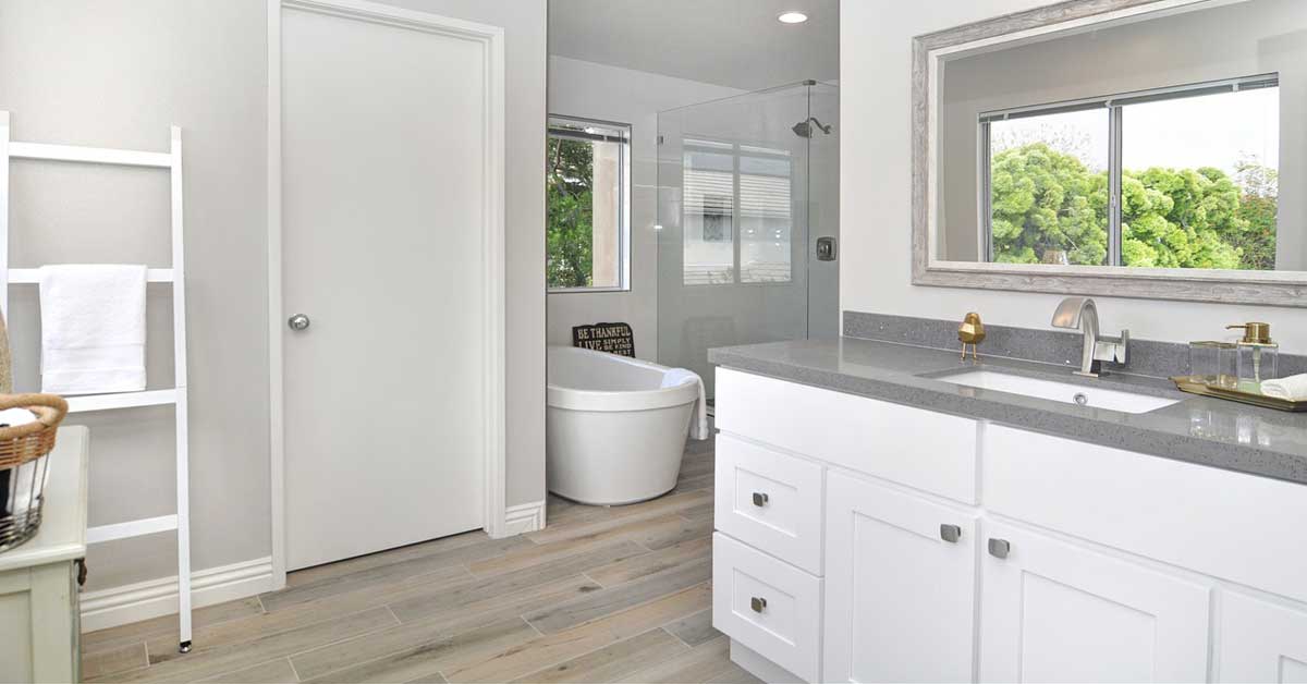 All white newly renovated bathroom with modern design.