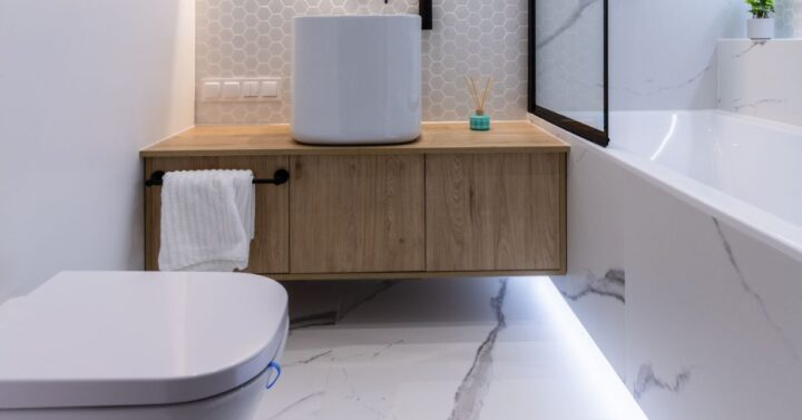 Shot of toilet, floating vanity and bath / shower combo maximising the space of a small bathroom