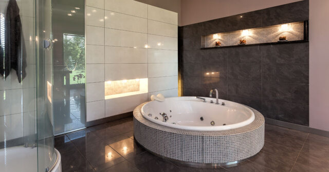 Impressive built in spa bath in private luxury bathroom.