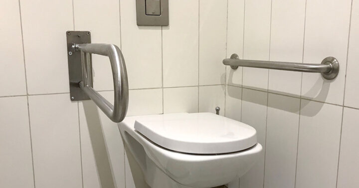 Handicapped Access Bathroom with Grab Bars and a Toilet