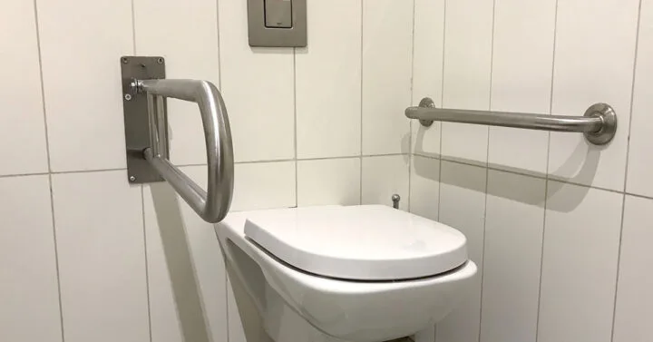 Handicapped Access Bathroom with Grab Bars and a Toilet